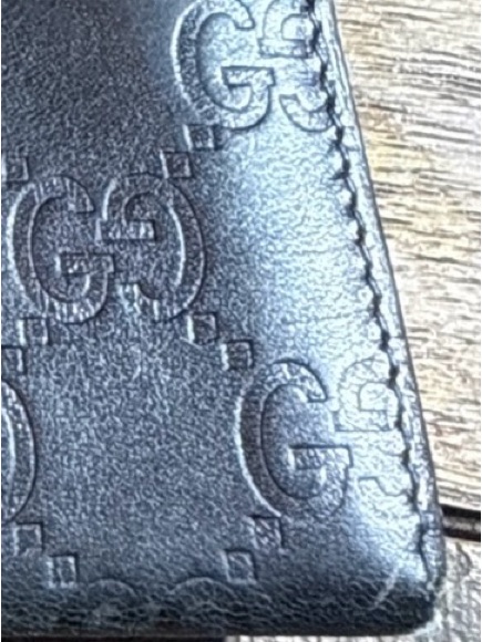 Authentic Gucci Black Embossed Leather Wallet With Signature Monogram